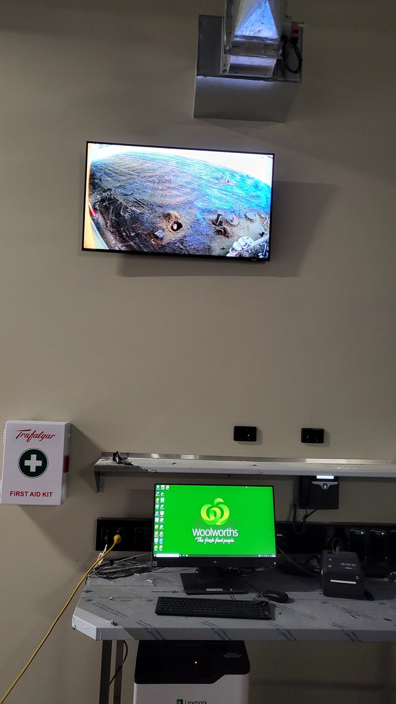 CCTV deterrent monitor at a shop entrance