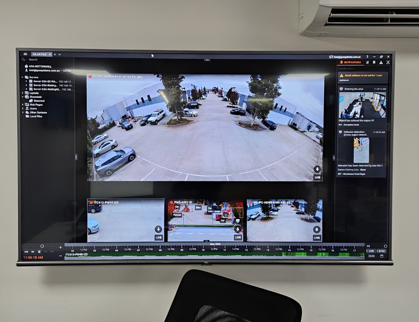 CCTV monitoring wall displaying live camera feeds CCTV monitoring wall displaying live camera feeds