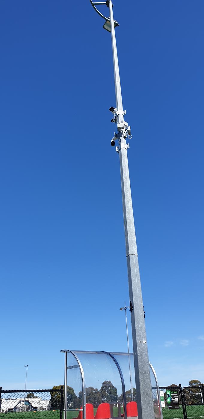 Multi-camera CCTV pole covering a commercial car park in Melbourne