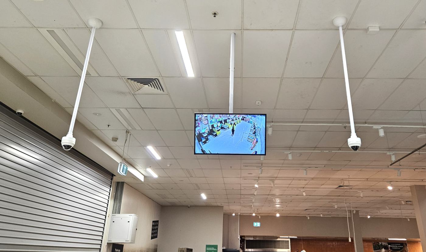 Ceiling CCTV camera array installed in a Melbourne retail store after hours