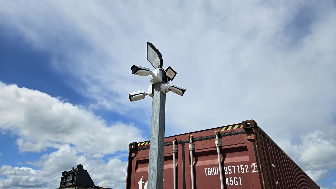Multi-head CCTV camera mast covering an industrial site perimeter in Melbourne