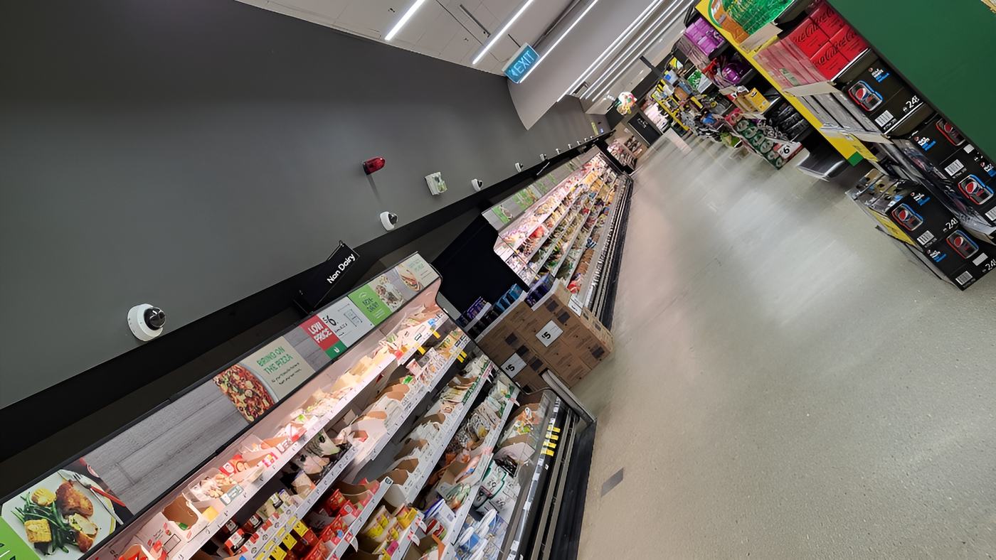CCTV coverage across a supermarket refrigeration aisle